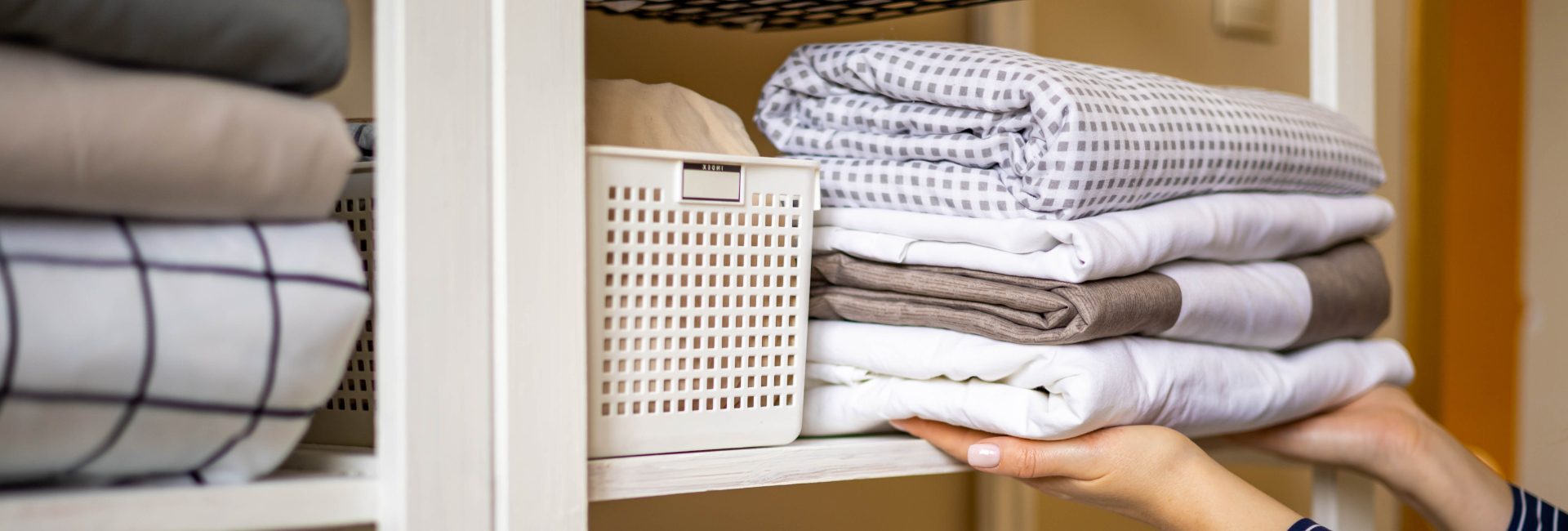 Linens Being Put Away 1920X650